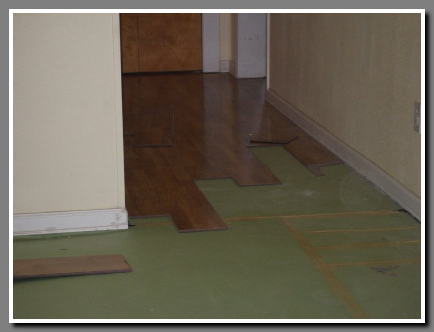 Hallway with laminate partially removed